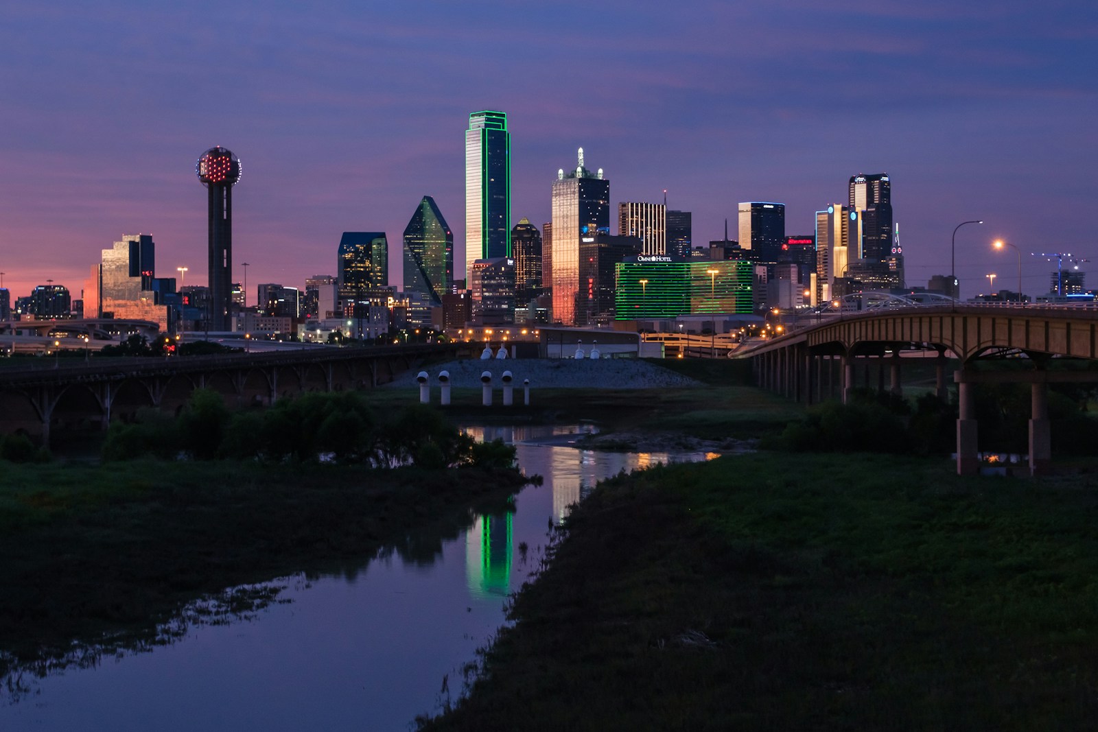 city skyline during night time